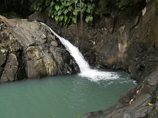 Saut d'acomat, tropical waterfall in basse terre, guadeloupe. Caribbean fall in the jungle and pond...