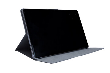 Black tablet in a black folio case isolated on white background - 783913573