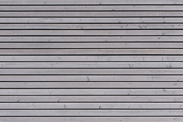 grey wooden wall background with horizontal boards and wood grain