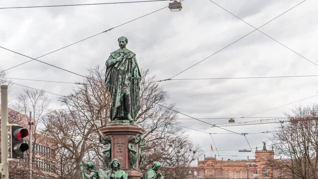 Maxmonument, Monument of Maximilian II of Bavaria timelapse, Maximilianstrasse street, Munich, Bavaria, Germany, Europe. Traffic on the road with tram rails. Maximilianeum building on a background