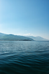 Lake Ohrid, North Macedonia, April 13 2024. Mountain range and peninsula in distance. Ohrid Lake,...