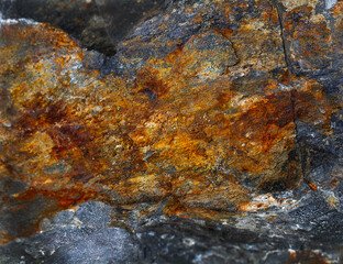 Orange and red rustic rock background. Detailed. Close up
