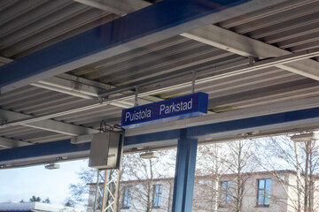 Puistola train station sign. Photo taken from the train.