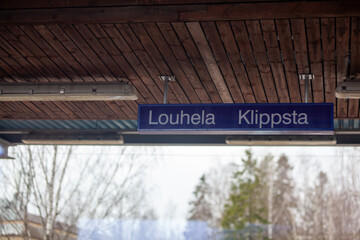 Louhela train station sign. Photo taken from the train.