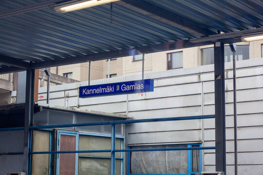 Kannelm&auml;ki train station sign. Daylight and blue tones.