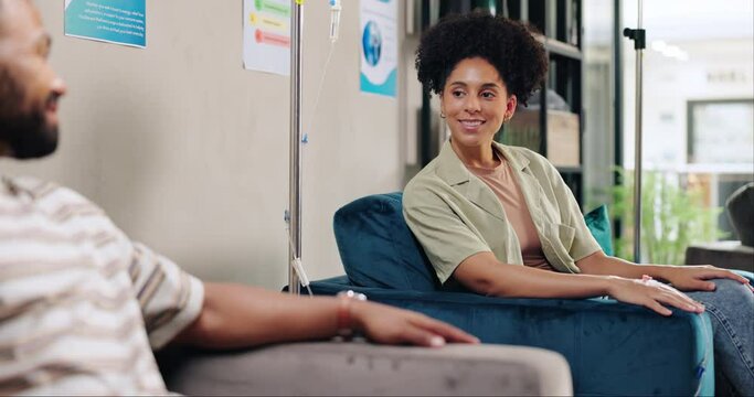 Hospital, IV and people in chemotherapy talking, in conversation and chat together for support. Healthcare, clinic and man and woman with liquid drip for cancer treatment, medicine and medication