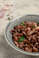 pickled honey mushrooms, in a bowl, homemade, top view, no people,