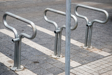 Bicycle rack bollards closeup in city street