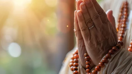 Tuinposter Hands Clasped in Prayer and Meditation © MP Studio