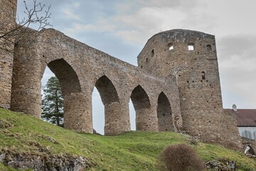 Fototapeta na wymiar Stone Bridge to the defensive tower of the medieval castle, Czech Republic