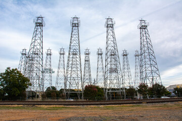 Iron oil derricks in the World's Richest Acre Park in downtown Kilgore, where the greatest concentration of oil wells in the world once stood, in Gregg and Rusk counties, Texas, USA