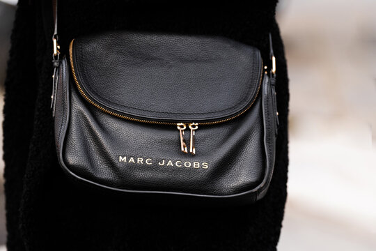 Milan, Italy - February, 21, 2024: woman wears Marc Jacobs, fashion blogger outfit details, street style.