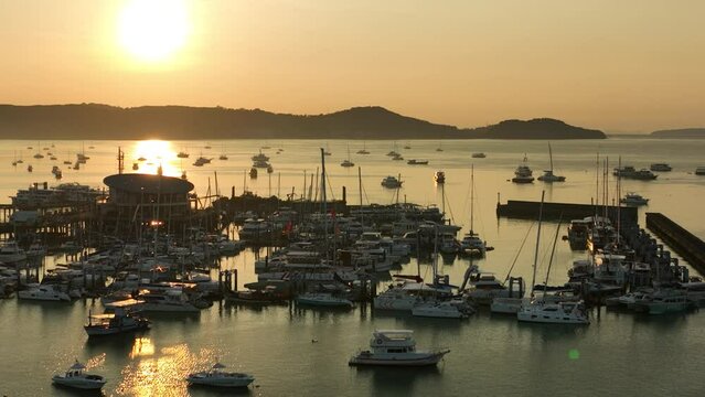 View of the bay with boats, dawn, aerial video from a drone