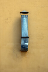 Old ventilation pipe on the wall