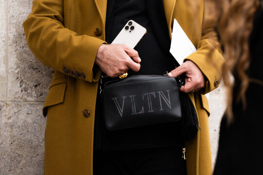 Milan, Italy - January, 25, 2024: woman wears Valentino, fashion blogger outfit details, street style