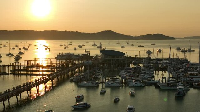View of the bay with boats, dawn, aerial video from a drone