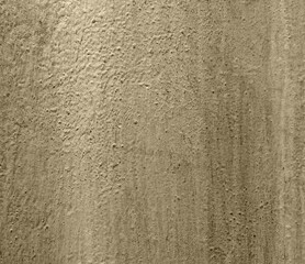 Yellowed metallic wall background, texture. Grey or dark-gray roughly painted surface. Old and faded wall and fence sketches. Dark, dingy and gloomy colors. Careless and poor painting
