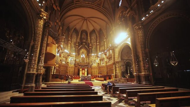 Catalonia. Interior of the Church of Montserrat. Abbey is located on the mountain of Montserrat. Church boys choir singing.
