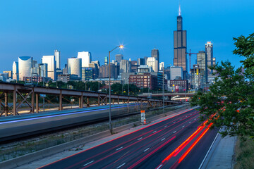 busy traffic on highway road with blurred cars light trails High speed road in evening abstraction. Chicago