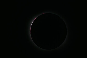 Total solar eclipse with bright solar flares