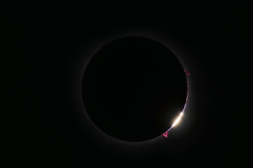 Total solar eclipse with bright Baily's beads, moon exit
