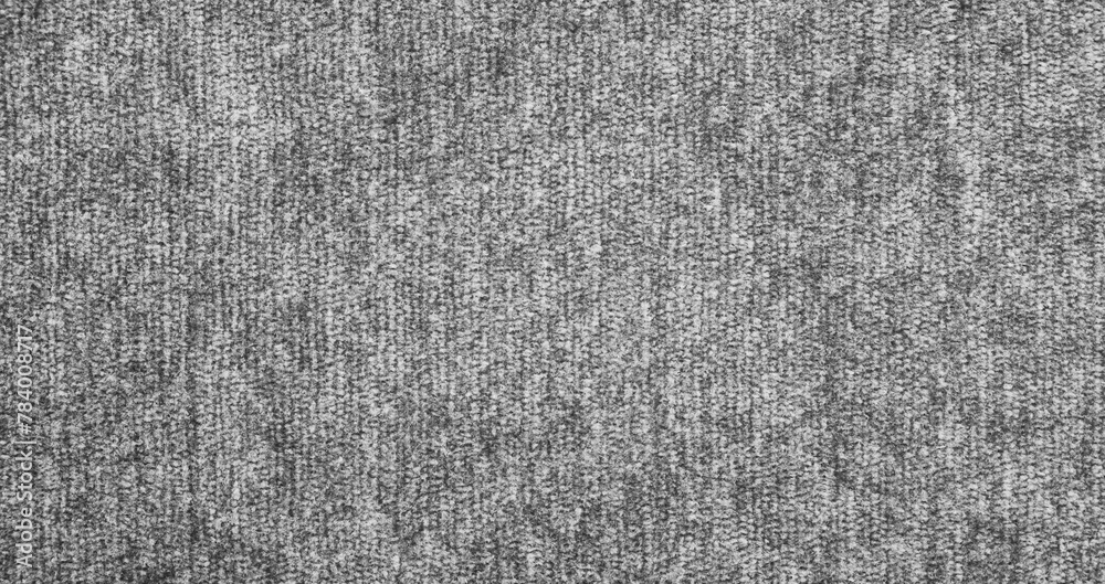 Poster a grey and white carpet with a lot of texture