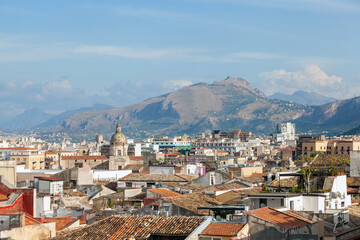 Palermo cityscape, Sicily, Italy. The vast urban landscape of Palermo unfolds under the watchful...
