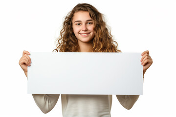 young girl smiling holds in hands empty white rectangular banner, isolated on white background