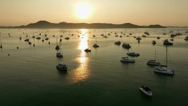 View of the bay with boats, dawn, aerial video from a drone