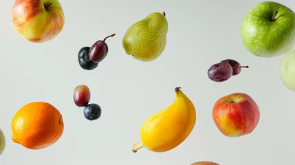 Fotobehang  várias frutas minimalistas flutuando no ar isoladas, fundo branco, espaço de cópia © Alexandre