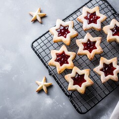 Star-shaped cookies with cherry filling, dark background, close-up, copy space