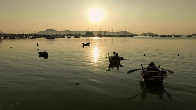 View of the bay with boats, dawn, aerial video from a drone
