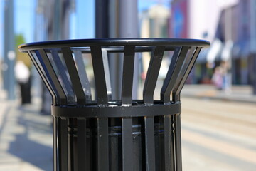 Black metal basket frame in the city