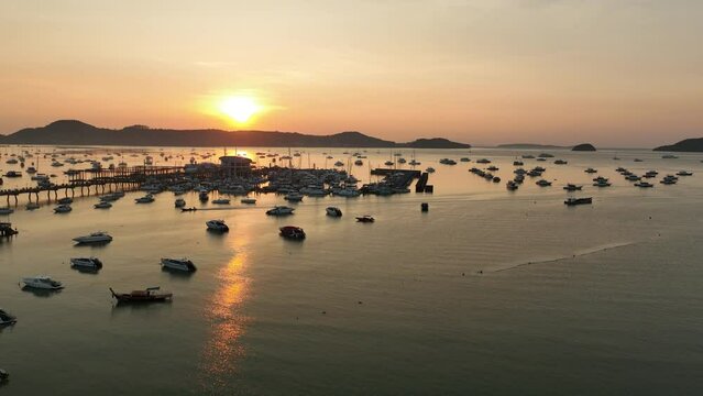 View of the bay with boats, dawn, aerial video from a drone