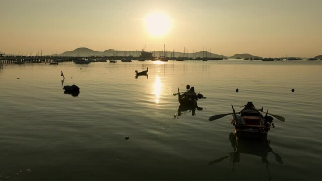 View of the bay with boats, dawn, aerial video from a drone