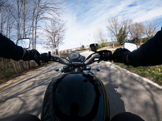 Riding a motorbike on an asphalt road