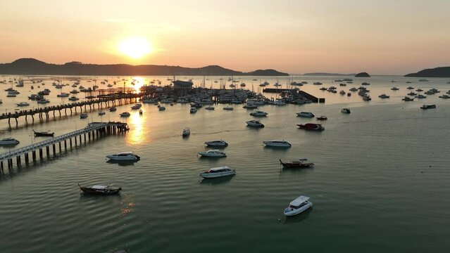 View of the bay with boats, dawn, aerial video from a drone