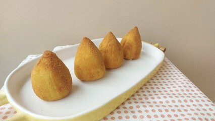 Delicious coxinhas on the table