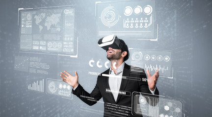Skilled business man looking data analysis while planning strategy by using visual reality glasses. Professional smart investor checking financial graph holographic while wearing VR goggle. Deviation.