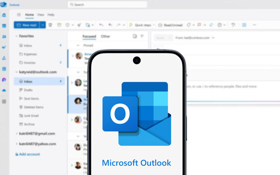 Microsoft Outlook Logo is displayed on a modern smartphone, application in the background, email client, with functions as calendaring, task managing, contact managing, notes
