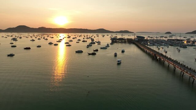 View of the bay with boats, dawn, aerial video from a drone
