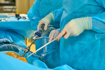 surgeons work in the operating room