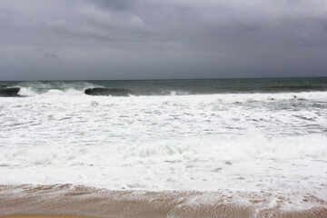 Sea and hurricane with Mexican coasts. Rainy day at the beach.