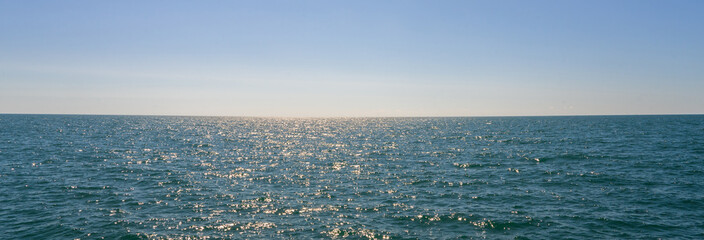 Blue-green beautiful sea under blue open sky, natural picture