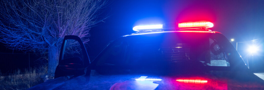 Front hood of a police car with "Police" written on it. stock photo