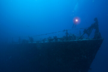 An underwater photographer exploring the bow of the Spiegel Grove shipwreck off Key Largo, Florida