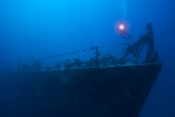 An underwater photographer exploring the Spiegel Grove shipwreck off Key Largo, Florida