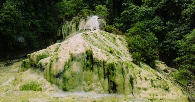 Aerial drone of natural hot spring Bilawa waterfall. Maco, Davao de Oro. Philippines.
