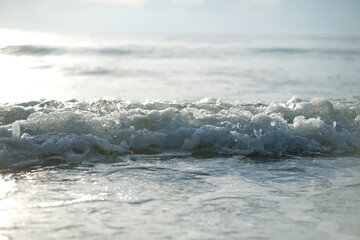 Beautiful morning waves foam