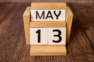 13 Thirteenth day May Month Calendar Concept on Wooden Blocks. Close up.